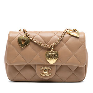 Pre-Loved Chanel Mini Rectangular Quilted Lambskin Heart Charms Flap